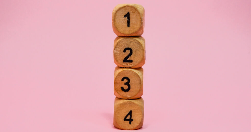 Stacked wooden blocks numbered 1 to 4