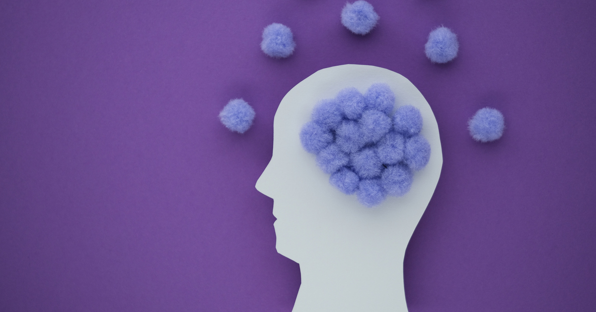 Silhouette with purple pom-poms brain on purple background.