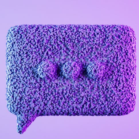 Speech bubble with particles on neon background. Digitally generated image.
