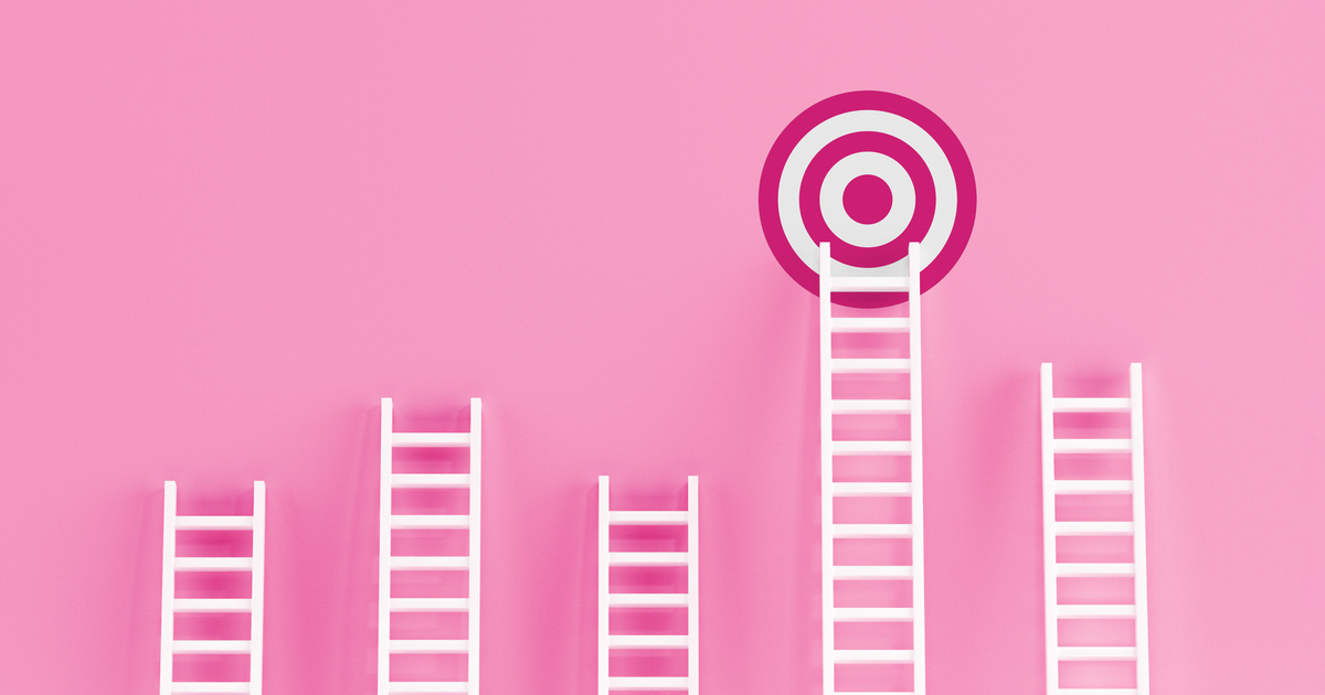 Ladders reaching a target on pink background.