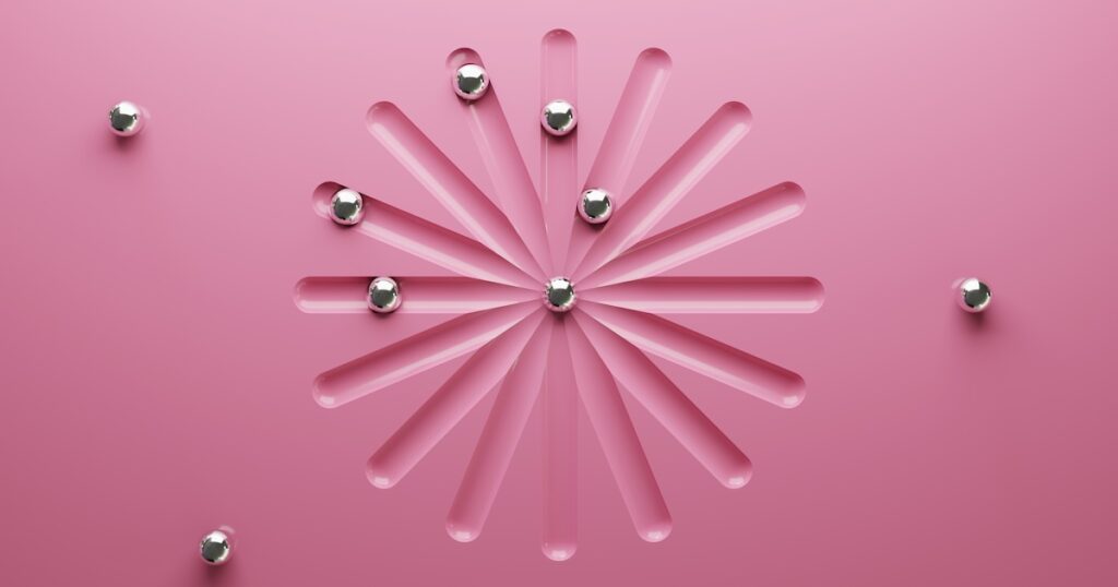Pink abstract design with metallic balls