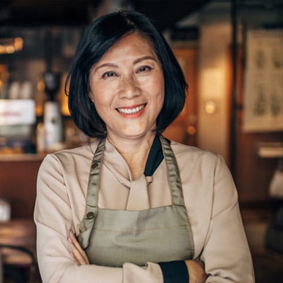 Asian woman restaturant owner