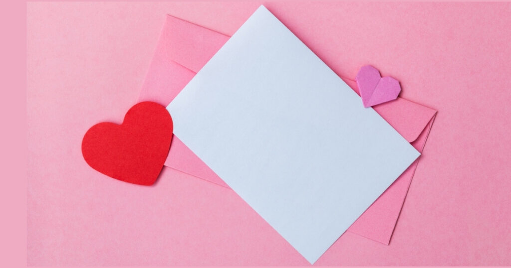 Valentine's card with pink and red hearts