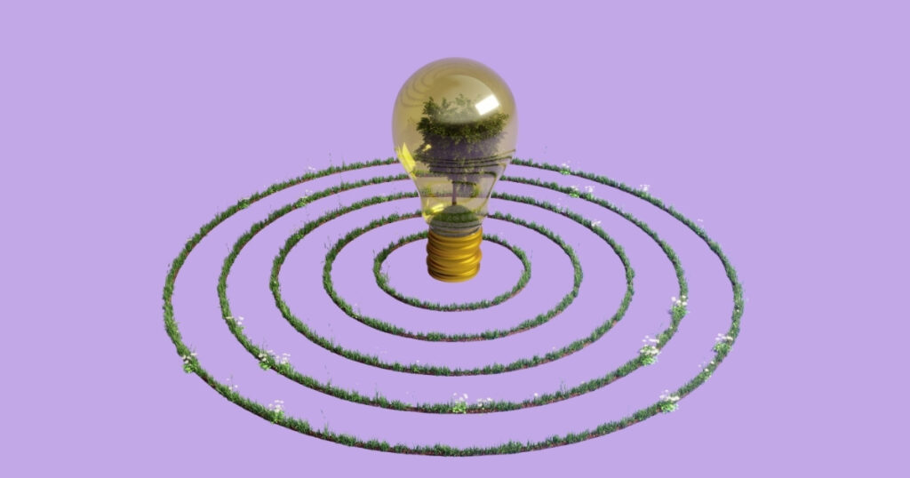Lightbulb with greenery and grass circles on purple