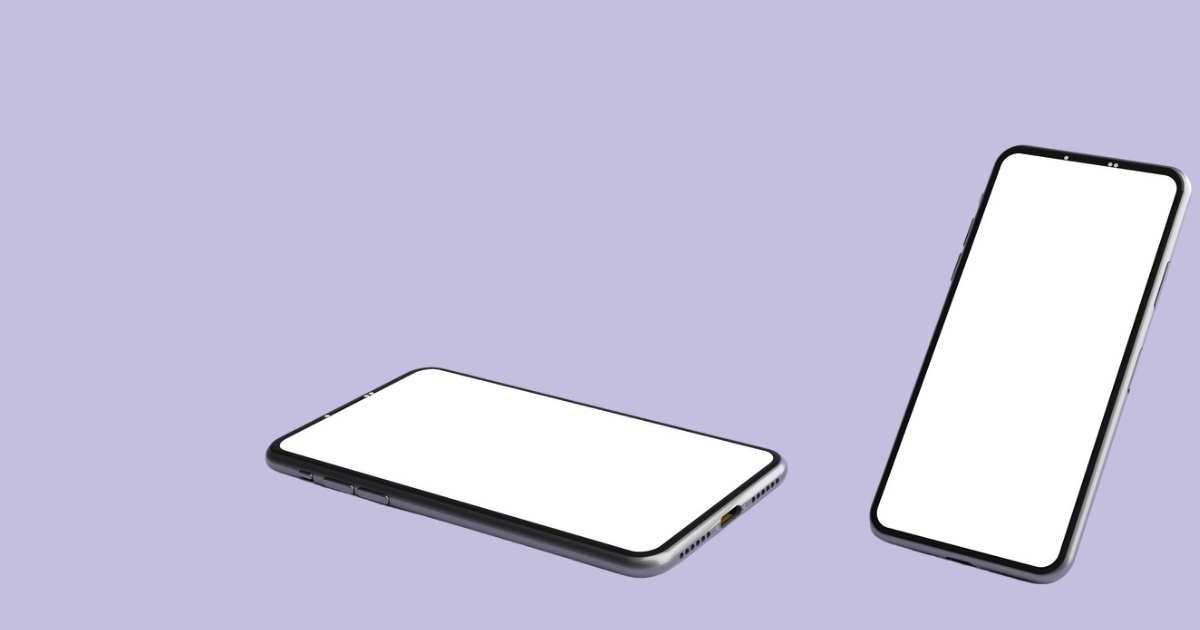 Two smartphones on purple background