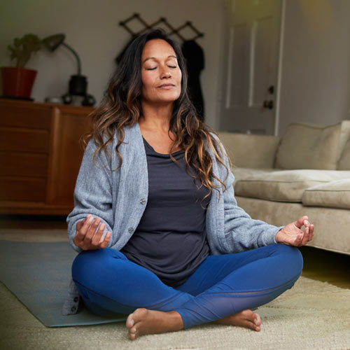 woman meditating while sitting, thumbnail