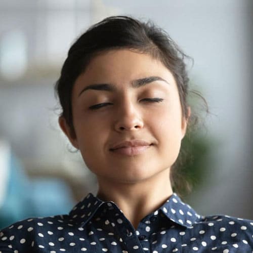 Indian woman taking a pause at work (thumbnail)