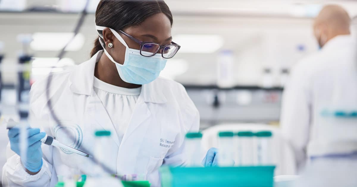 black female scientist conducting laboratory research