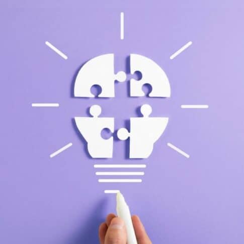 Puzzle pieces forming an idea (illustration)