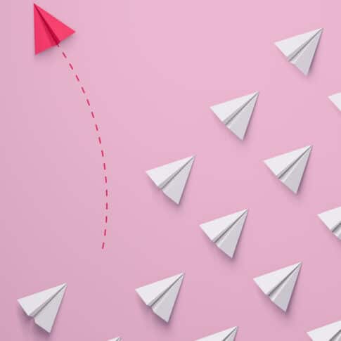 Individual and unique leader pink paper airplane changing direction. Individuality Women's leadership concept. 3d rendering.