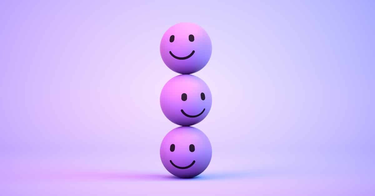 3d rendering of Emoji with smiley face on purple background