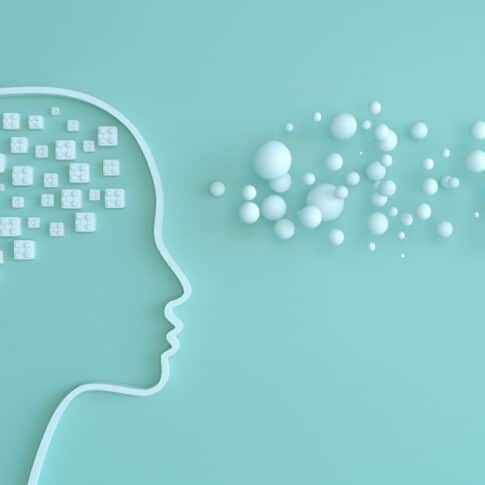 abstract human head outline with 3d blocks and spheres