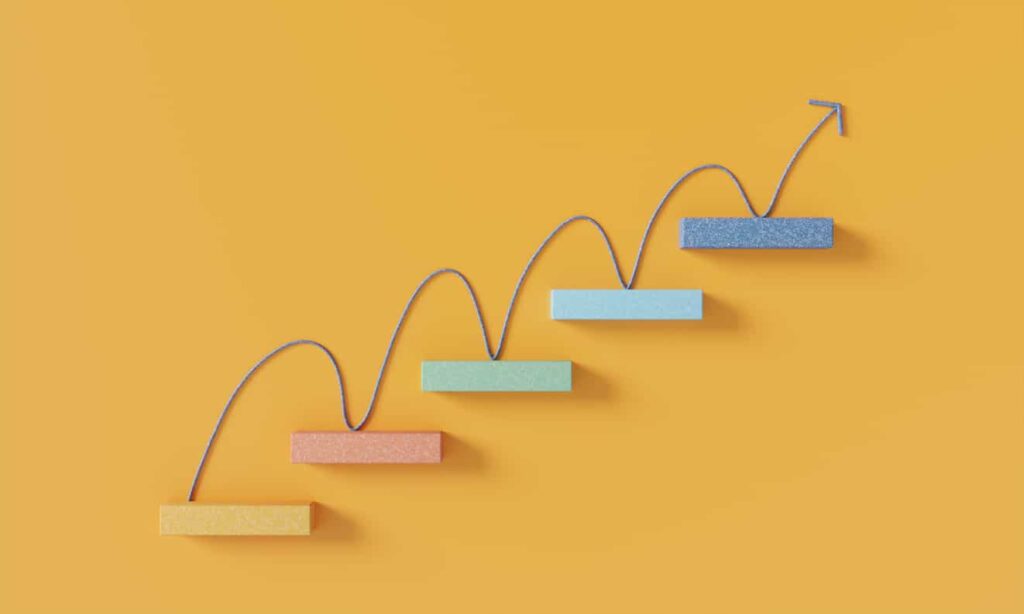 Colorful bar chart with upward arrow trend