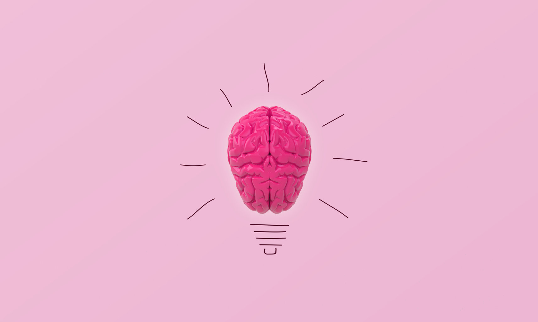 glowing pink brain as light bulb concept