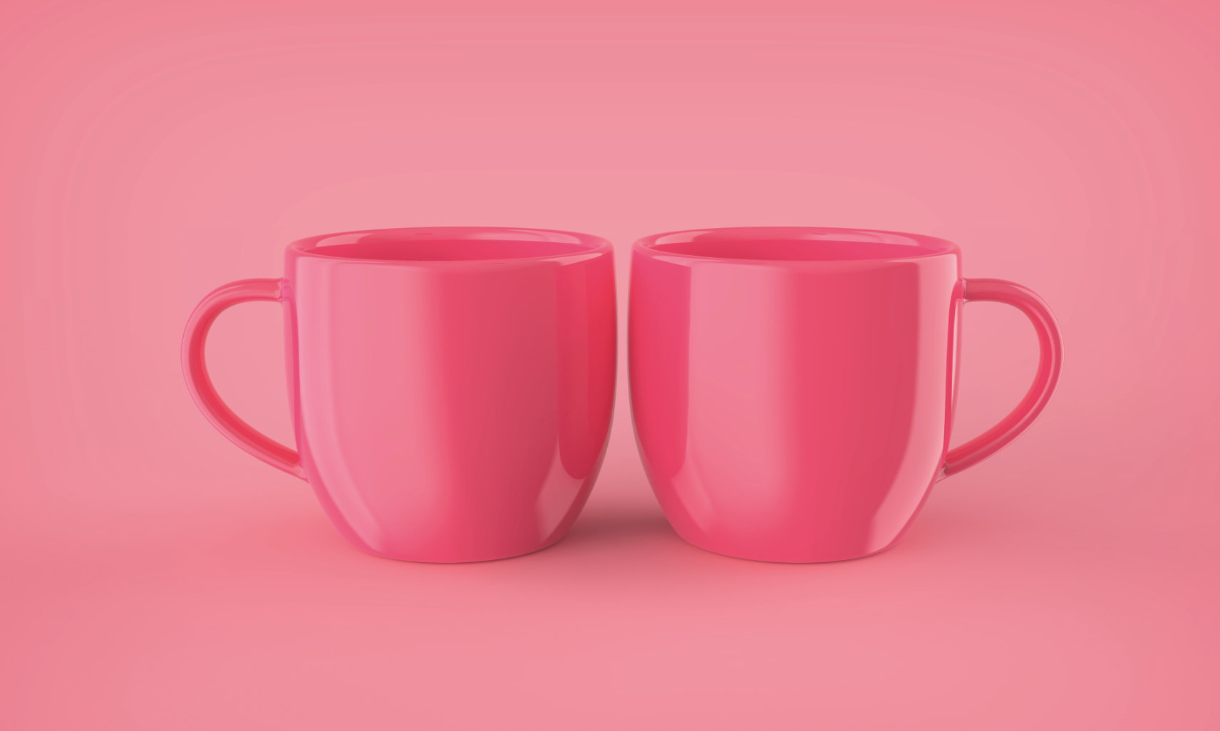 two pink mugs on pink background