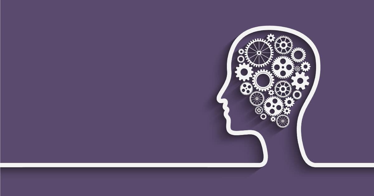 human head silhouette with gears on purple background