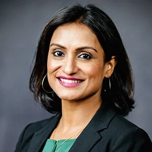 Professional woman smiling in business attire portrait