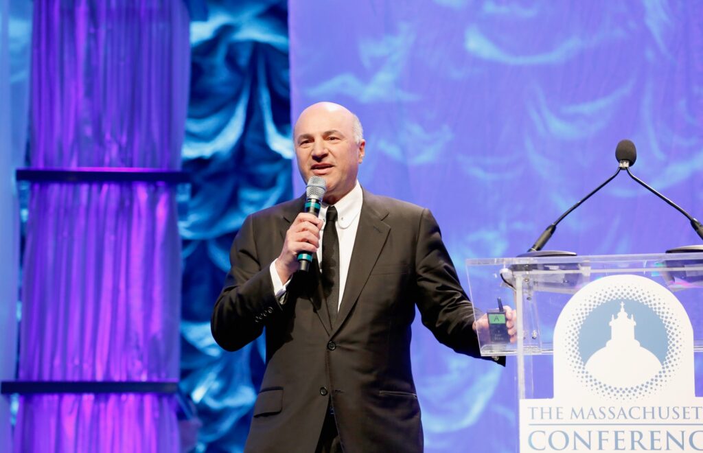 Kevin O'Leary speaks at Massachusetts Conference podium