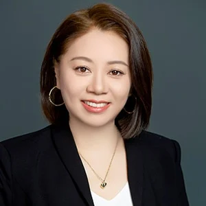 Professional woman smiling in business attire