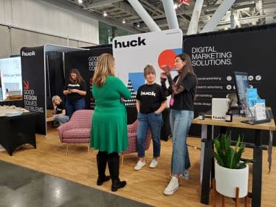 People networking at a digital marketing booth