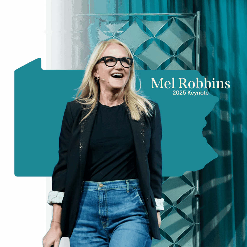 Mel Robbins on stage during keynote event