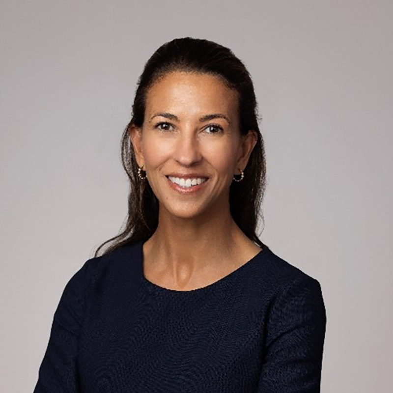 Smiling woman in dark dress portrait