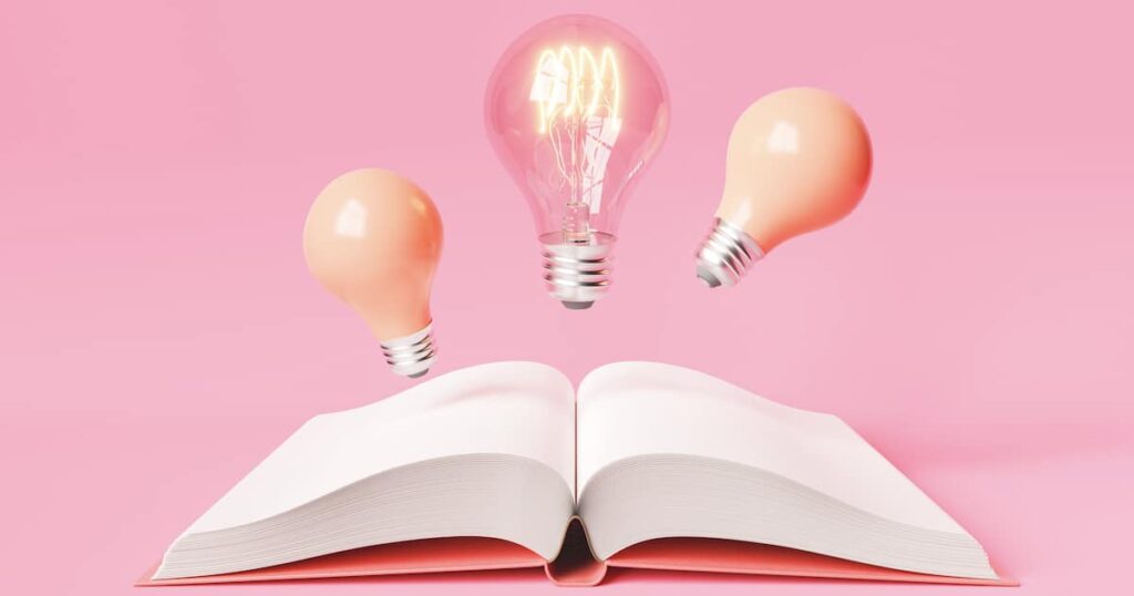 3d rendering of glowing and pink light bulbs levitating above opened book with empty pages for new idea on pink background