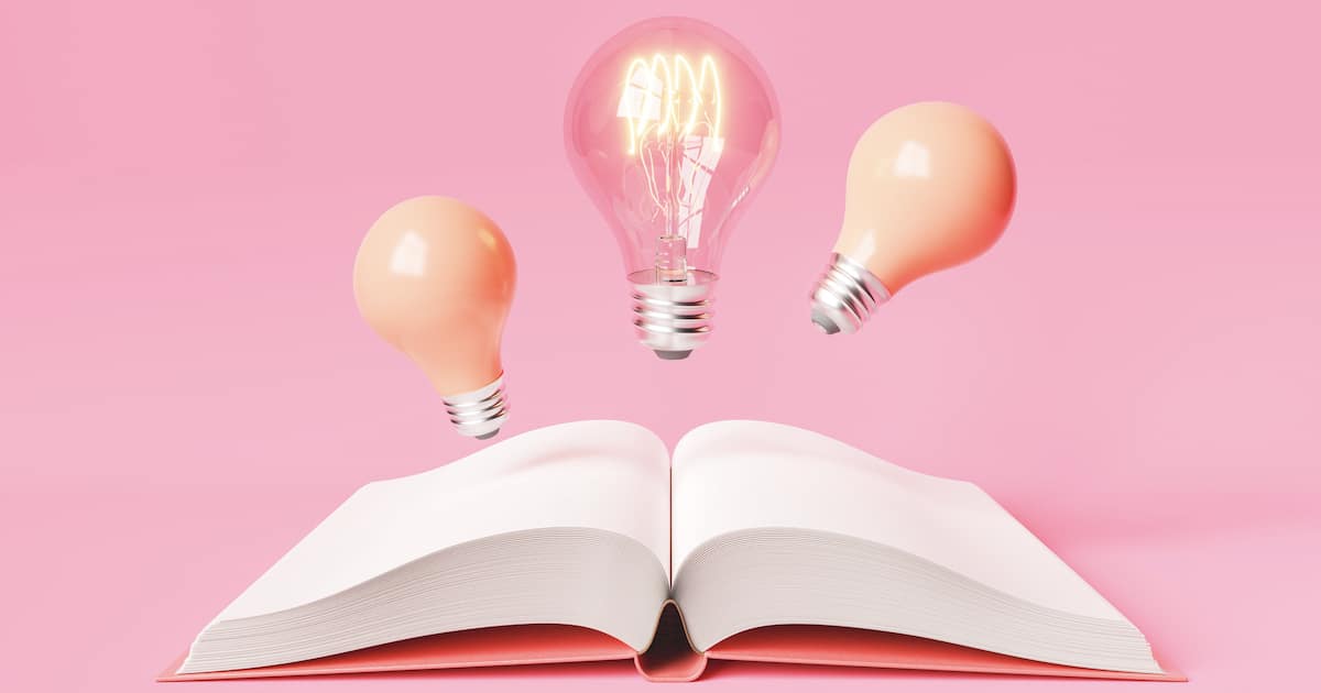 3d rendering of glowing and pink light bulbs levitating above opened book with empty pages for new idea on pink background