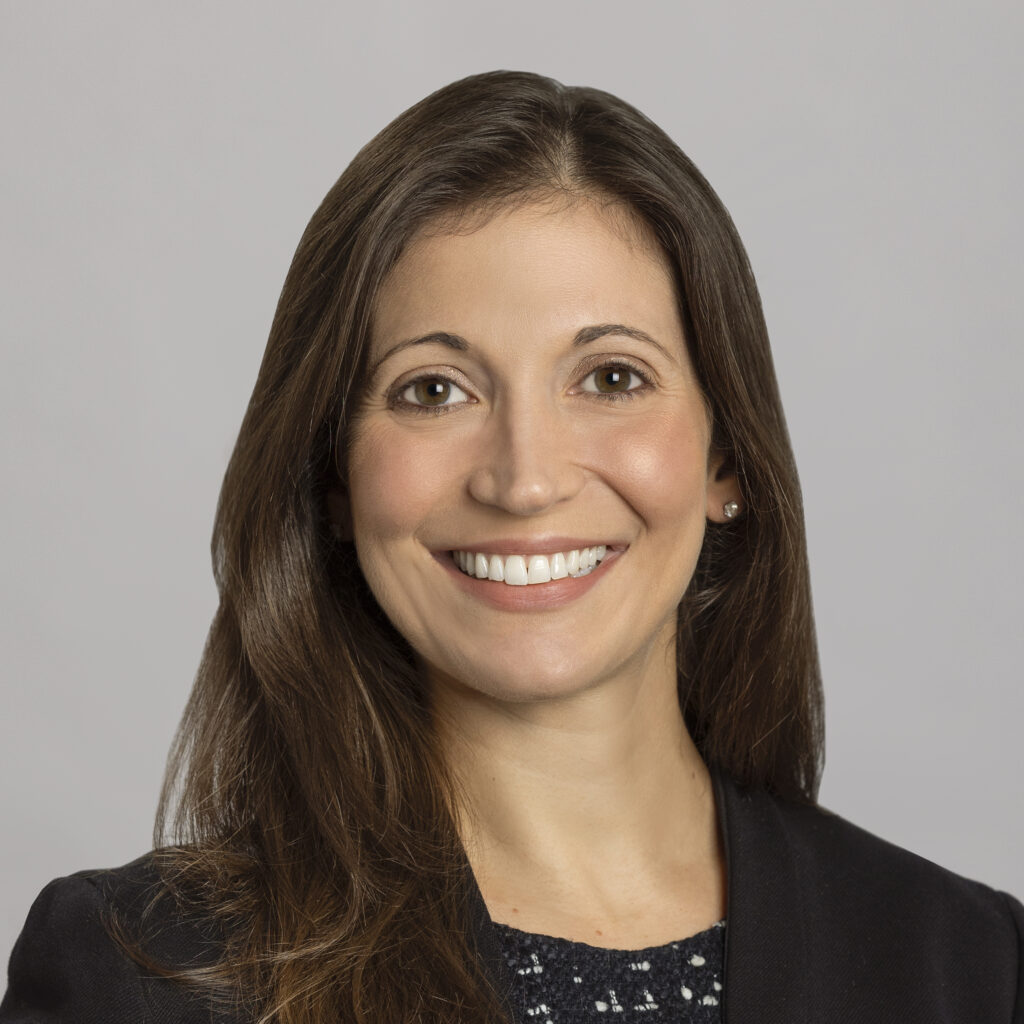 Smiling woman in professional attire headshot