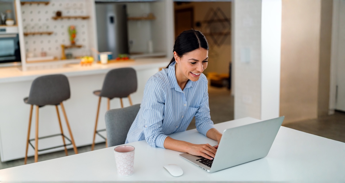 Woman connecting with others on her laptop