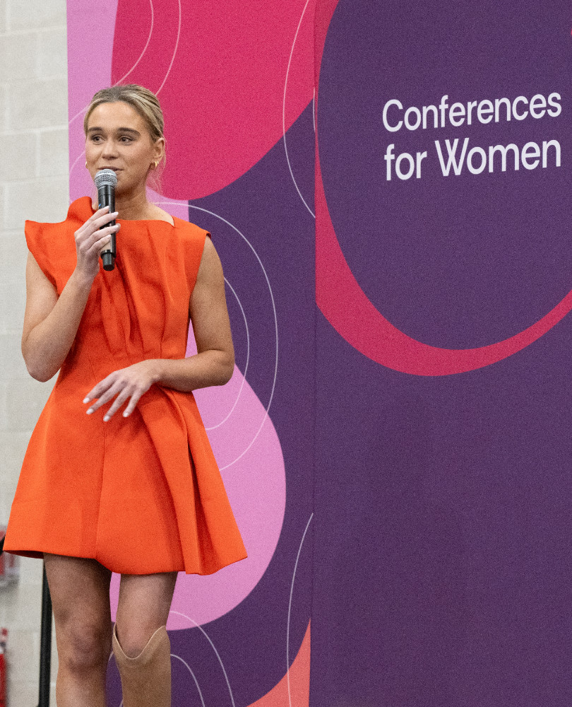 Ali Truwit speaking at the Conference for Women