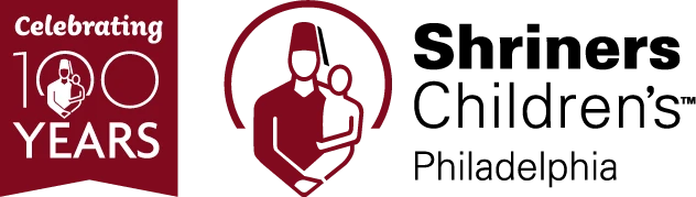 Shriners Children's (Philadelphia) 100 Years anniversary logo with parent and child