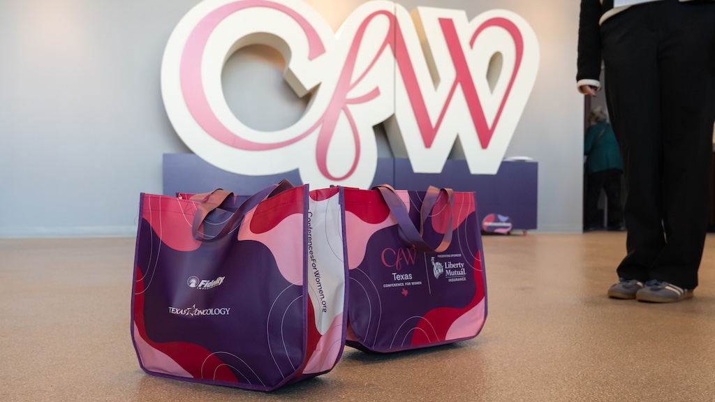 Branded tote bags at Conference for Women event