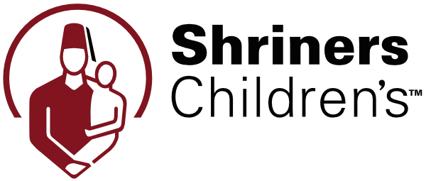 Shriners Childrens Hospital of MA logo featuring a person holding a child